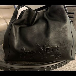 Coach Black Leather Horse and Carriage Handbag.